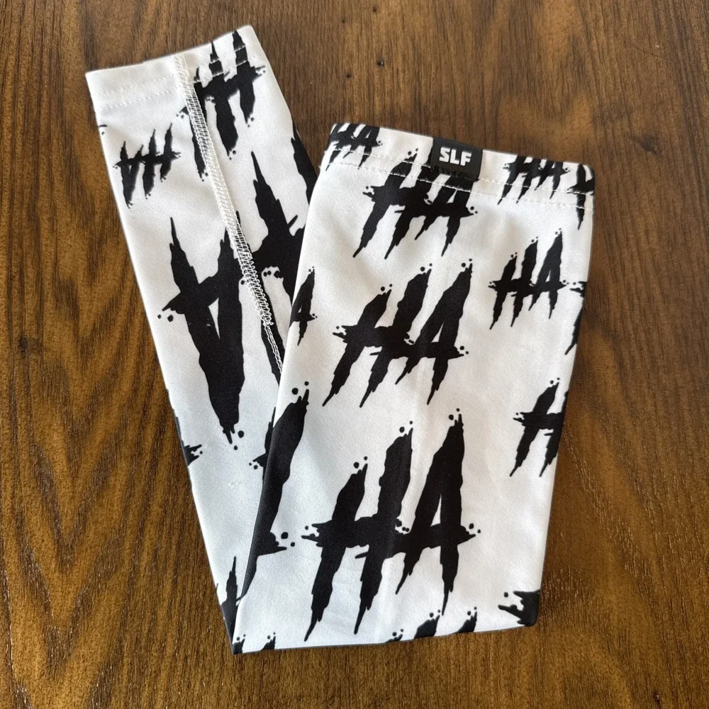 SLEEFS Arm Sleeve Size S/M Black And White HA HA HA Football Baseball